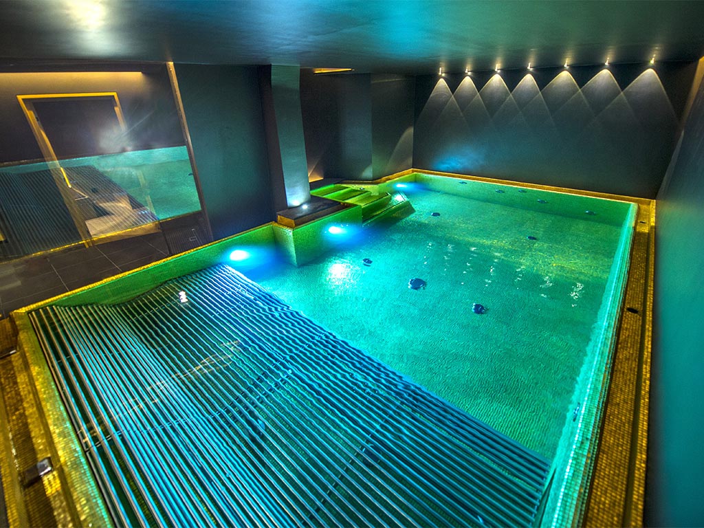 The large pool with hydro massage beds and water games